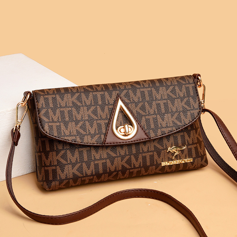 Women's bag 2023 New Fashion pattern shoulder messenger bag simple Joker middle-aged mother bag a generation of hair