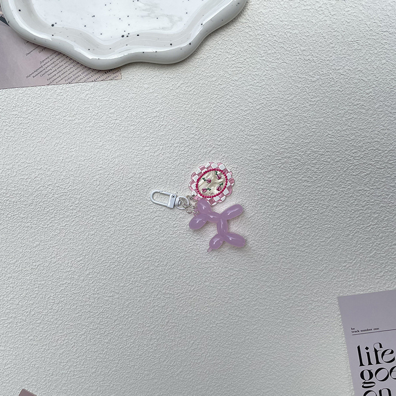 Pequeño Libro Rojo mismo lindo jalea globo láser perro llavero colgante colorido cachorro de dibujos animados teléfono llavero