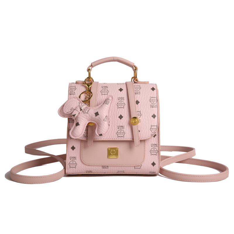 Mochila de moda coreana para mujer, bolso de mensajero con estampado de moda ringge de estilo occidental, bolso de viaje con colgante de cachorro lindo