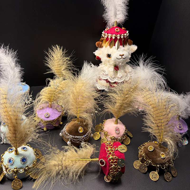 DIY handmade sheep hats from the Xinjiang Grand Bazaar, featuring a lucky sheep design, are a popular souvenir.