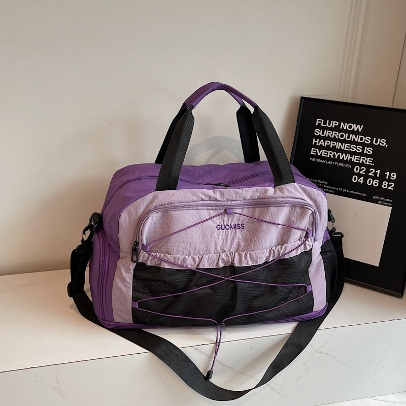 Nicho de diseño de moda moda moda bolsa de mano de mujer gran capacidad bolsa de viaje corto bolsa de almacenamiento bolsa de viaje deportiva al aire libre