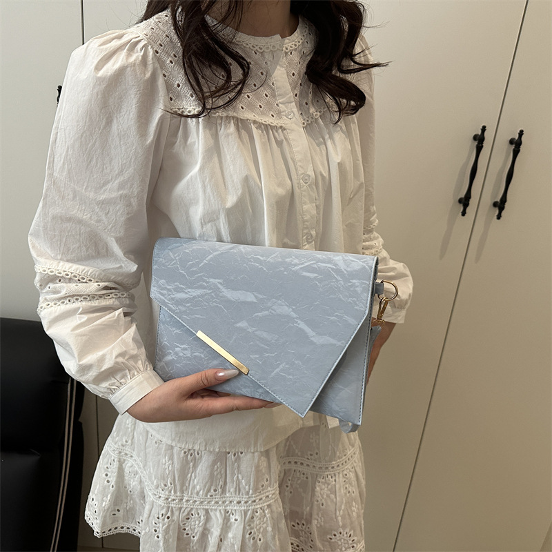 Bolsos pequeños de nicho, bolsos de mujer, nuevos embragues de todo fósforo de moda, populares de este año, embragues de alta gama, sobre