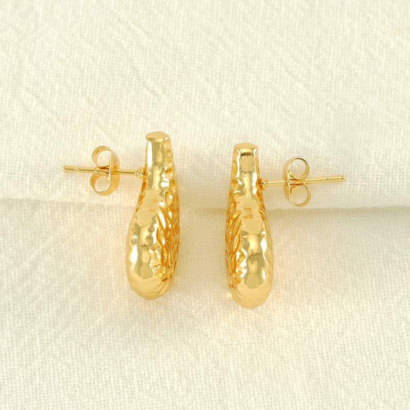 Cruz-frontera europea y americana desigual textura gota-en forma de pendientes de moda todo fósforo de acero inoxidable pendientes de la joyería al por mayor para las mujeres