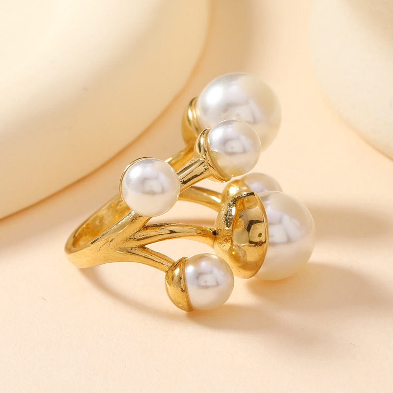 Anillo de perlas de moda europea y americana no se desvanece seis perlas abiertas anillo ligero de lujo de alta calidad joyas de acero inoxidable