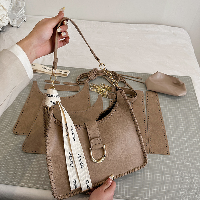 Bolsa de material de estilo británico bolsa de axilas de Superficie suave DIY hecho a mano tejida bolso diseño sentido no colisión solo bolso de hombro