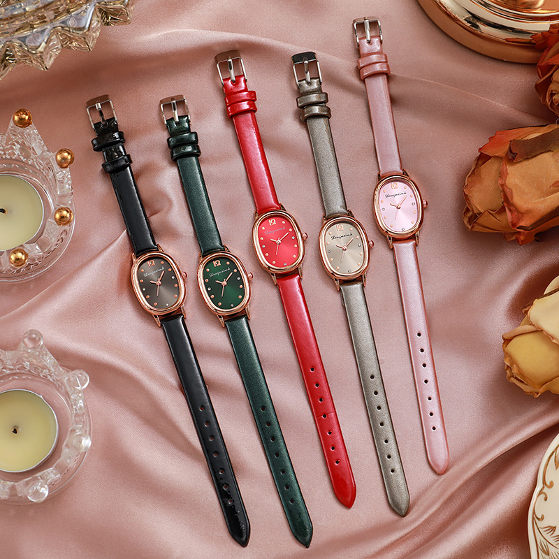 Nuevo elegante retro simple oval estudiante reloj nicho alto sentido de las mujeres reloj cinturón de cuarzo reloj de las mujeres al por mayor