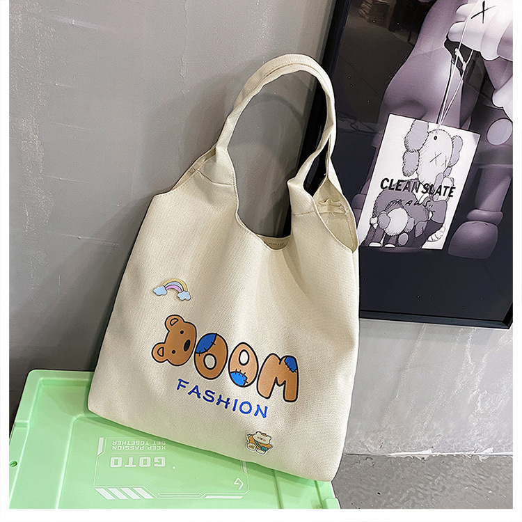 2021 Summer Japanese-style simple canvas bag, student backpack, single-shoulder handbag for going out, cartoon badge cotton bag undefined