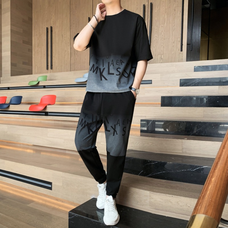 Dispositivo de deporte casual de hombre marca de moda camiseta de cuello redondo manga corta versión suelta de dos piezas conjunto de pies nueve puntos