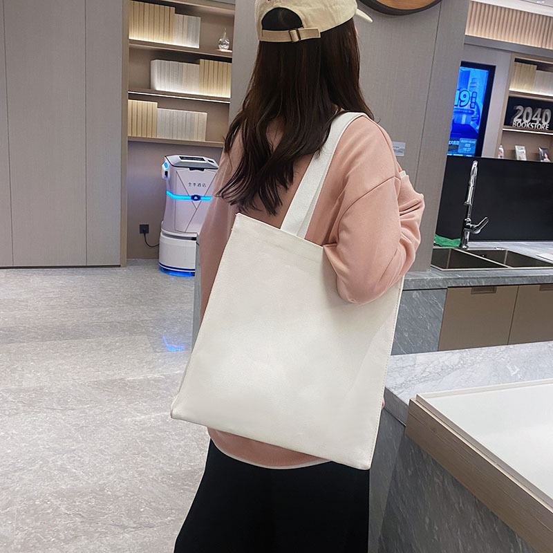 帆布袋logo单肩手提袋2024大容量帆布包高定广告宣传布袋子白色