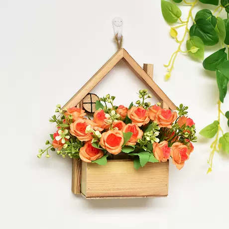 Wooden house + orange rose