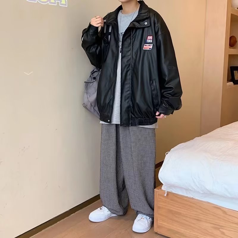 Chaqueta de cuero de pu con solapa de calle principal, chaqueta etiquetada, primavera y otoño para hombres, estilo de Hong Kong, pareja de nicho, chaqueta suelta de calle frita