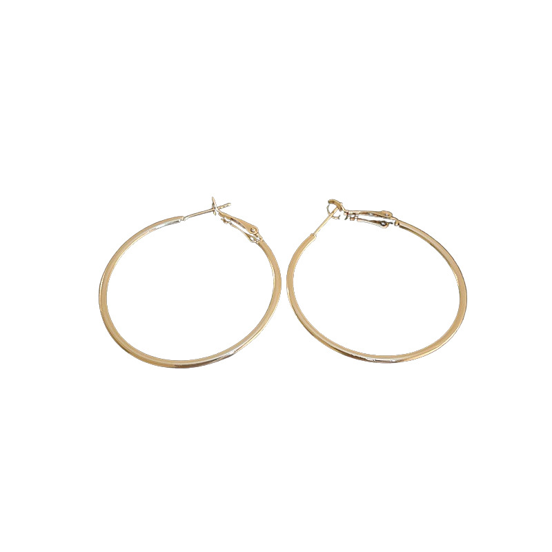 Aguja de plata minimalista redondo liso pendientes nicho estilo frío pendientes elegantes de Cercanías de alta calidad pendientes de moda al por mayor