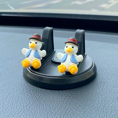 Car phone holder: Central Control Instrument Panel Car - sitting-mobile-phone-bracket-blue-clothes-duck