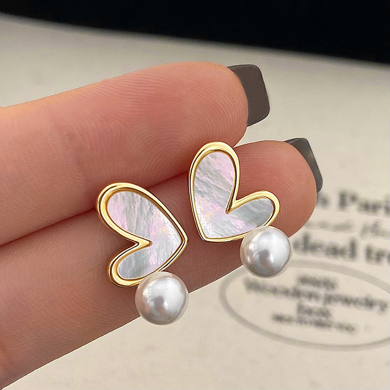 Fashionable elegant design earrings with zircon heart shaped from…