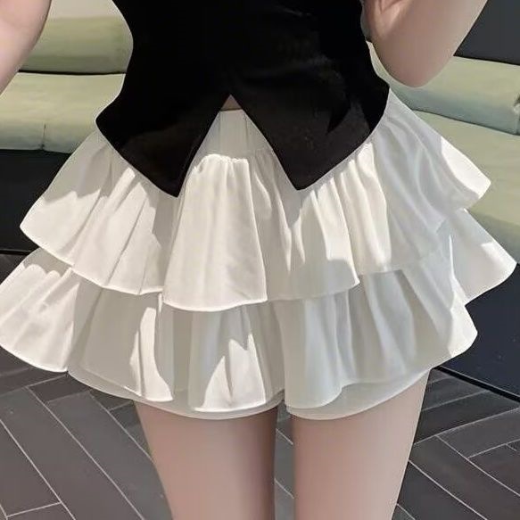 Váy xếp li trắng