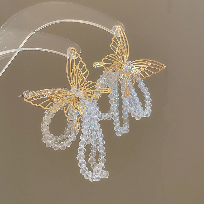 Pendientes de borla de cristal de mariposa de circón de aguja de plata Pendientes de lujo ligero de moda francesa Pendientes de temperamento femenino Sensación de clase alta de nicho