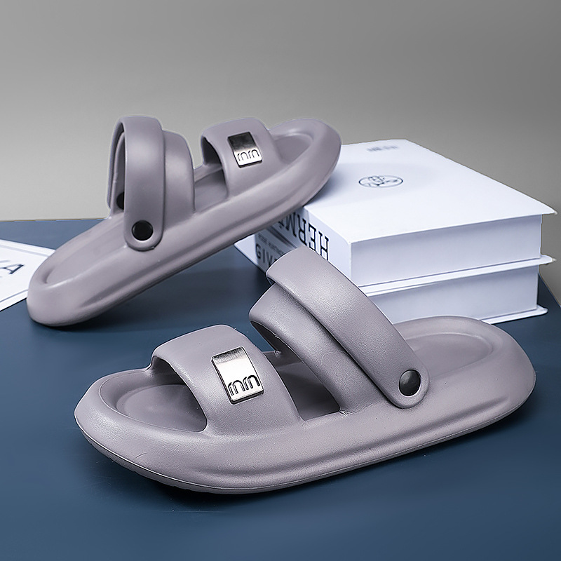 2025 primavera nuevas zapatillas de hombre para usar en el hogar para pisar pedazos gruesos sandalias de fondo suave para hombres al por mayor antideslizantes
