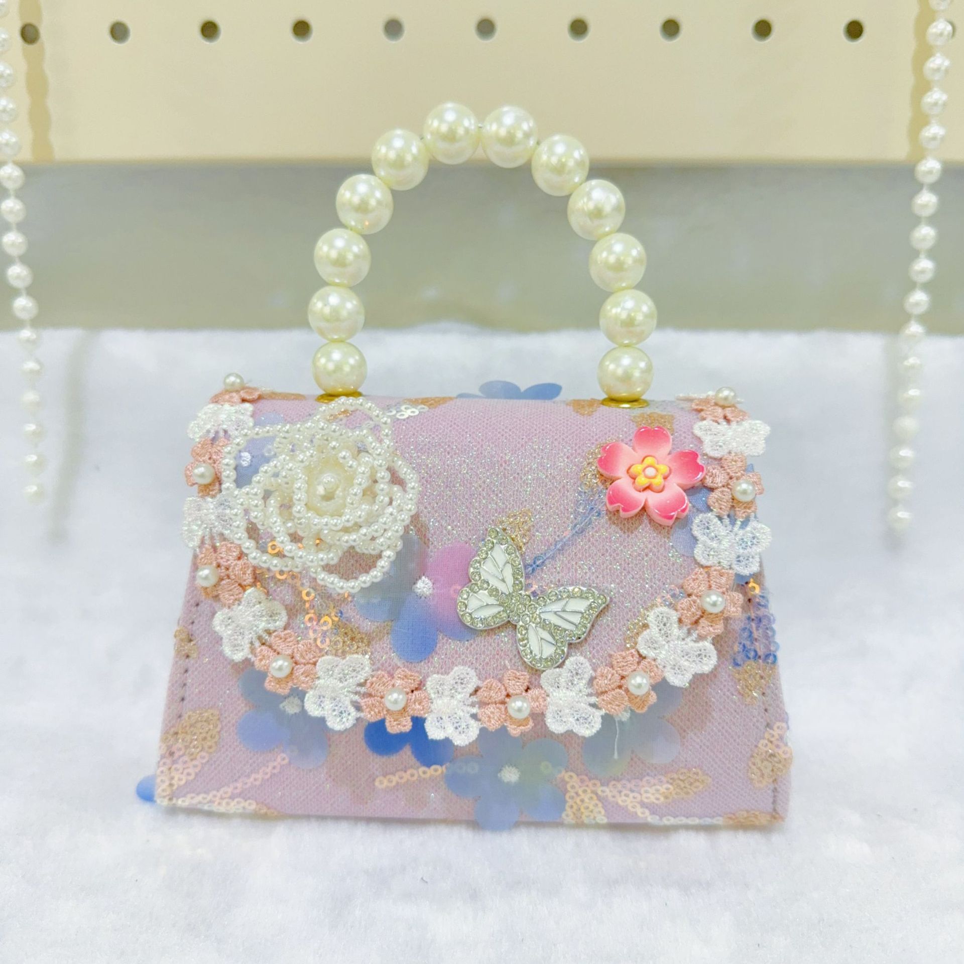 Bolsos infantiles, bolsos de cambio de niña, bolsos de mano de perlas, bolsos de almacenamiento, accesorios de perlas.