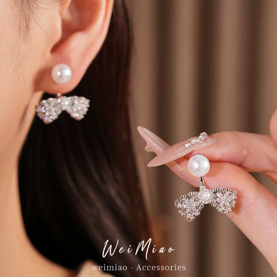 Agujas de plata Zircon arco perlas perlas orejetas coreanas exquisitas cotidianas de viaje versátil pendientes ligeros de lujo alta sensación de orejetas
