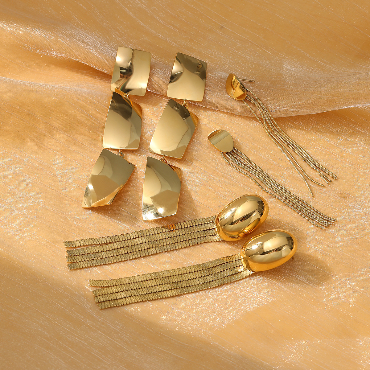 Fashionable geometric universal trend earrings with tassels…