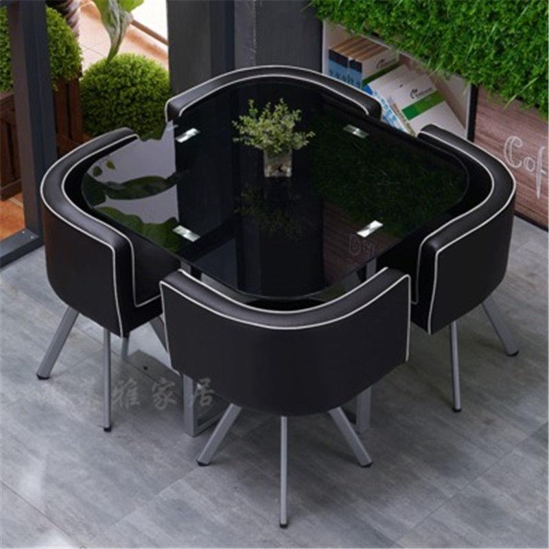 Mesa y sillas de comedor modernas, mesa redonda pequeña de vidrio templado, mesa y sillas para recepción y negociación, una mesa y cuatro sillas, cocina de inducción.