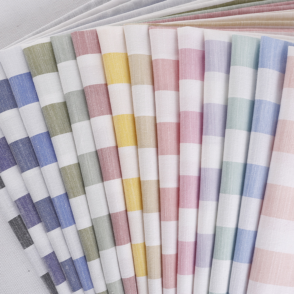 现货春夏仿麻条纹面料 时尚竹节宽条女装童装连衣裙衬衫条纹布料