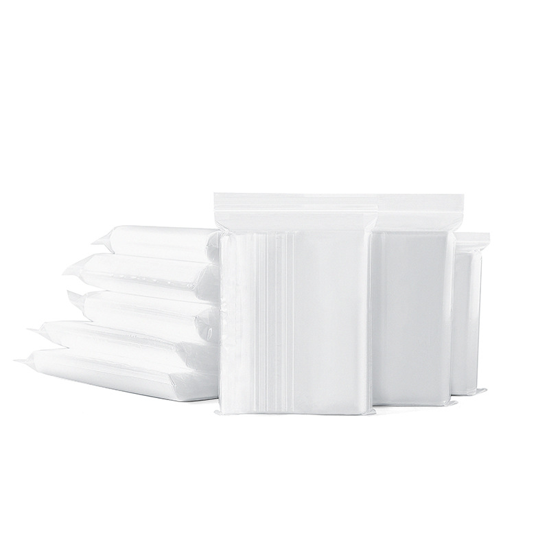 En stock al por mayor de sellado de plástico bolsa de plástico máscara de alimentos sellado de almacenamiento compacto bolsa de embalaje transparente PE ziplock bolsa