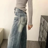 Washed blue trousers