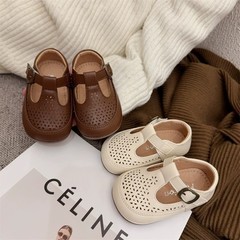 2025春夏の新型ベビーシューズ韓国版の女の子の透かし彫りの通気性の靴の幼児の柔らかい底のファッションは百合です。
