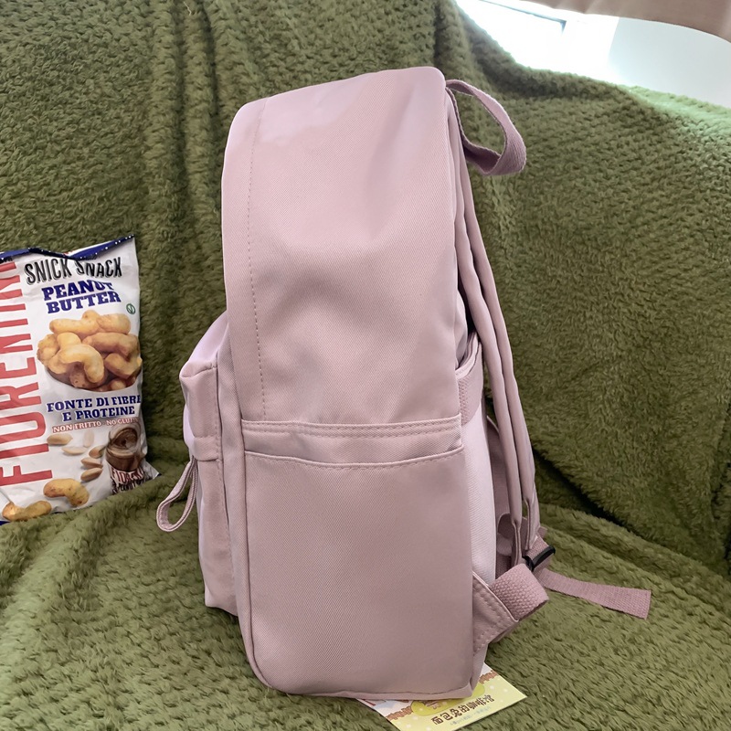 Comercio exterior al por mayor 2023 nueva mochila coreana de nailon para estudiantes de secundaria