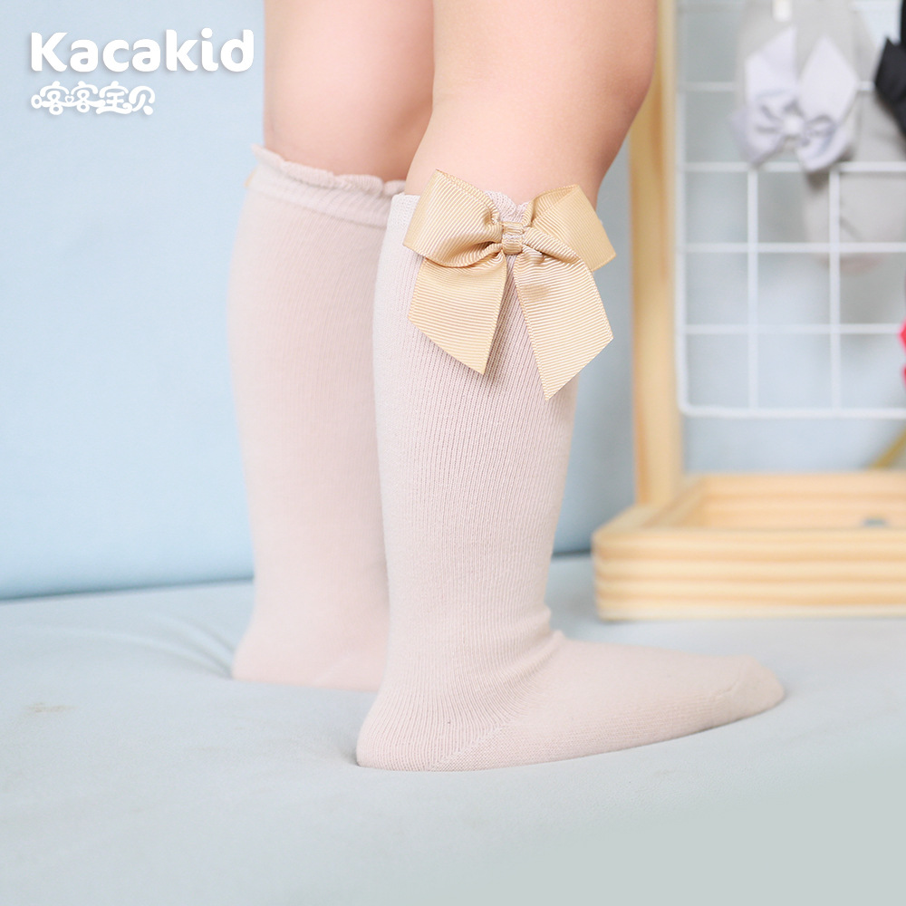 Venta al por mayor primavera nuevos NIÑOS Calcetines niñas monocromo rayas burbuja boca media pantorrilla calcetines bebé arco calcetines de algodón princesa Calcetines