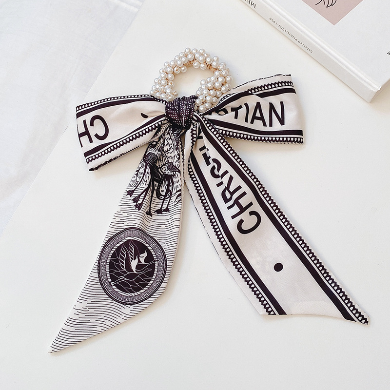 Banda de pelo de bufanda de seda corbata de pelo femenina Shixi Cinta de lazo de perla sale todo partido cuerda de cabeza Shixi 2021 cabello nuevo