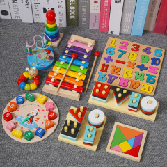 八音の手は琴をたたいて、乳幼児は早く楽器の音楽を教えます。