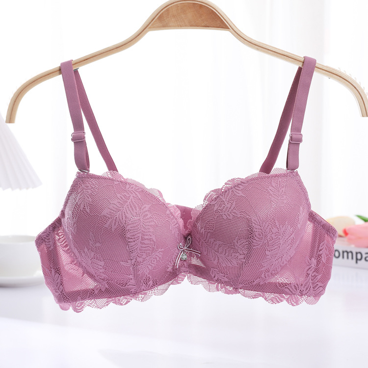 Fábrica de stock pequeño pecho grueso sujetador sexy encaje reunido ropa interior de mujer con anillo de acero sobre el bra de caída
