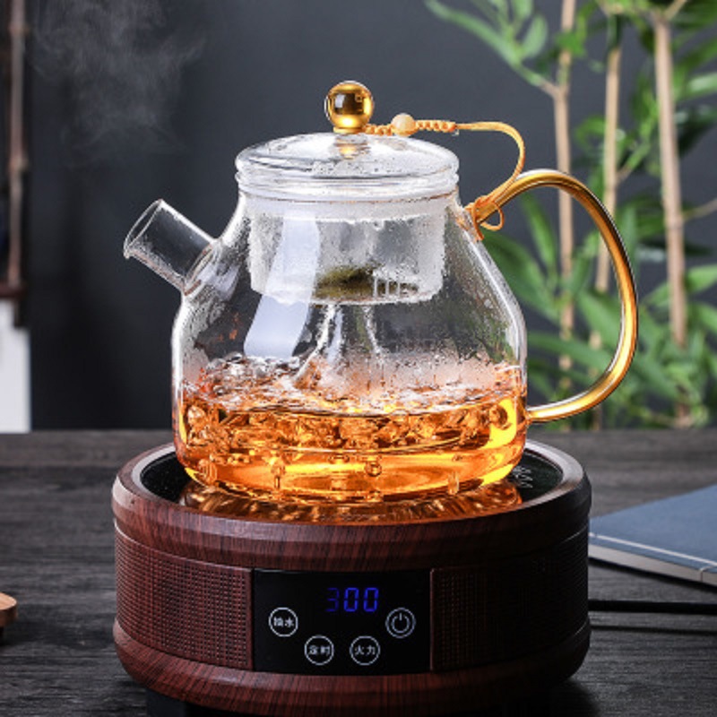 Fábrica mayorista de tetera de vidrio de alto borosilicato puede cocinar tetera de cerámica eléctrica tetera de té casera tetera de té de flores de té