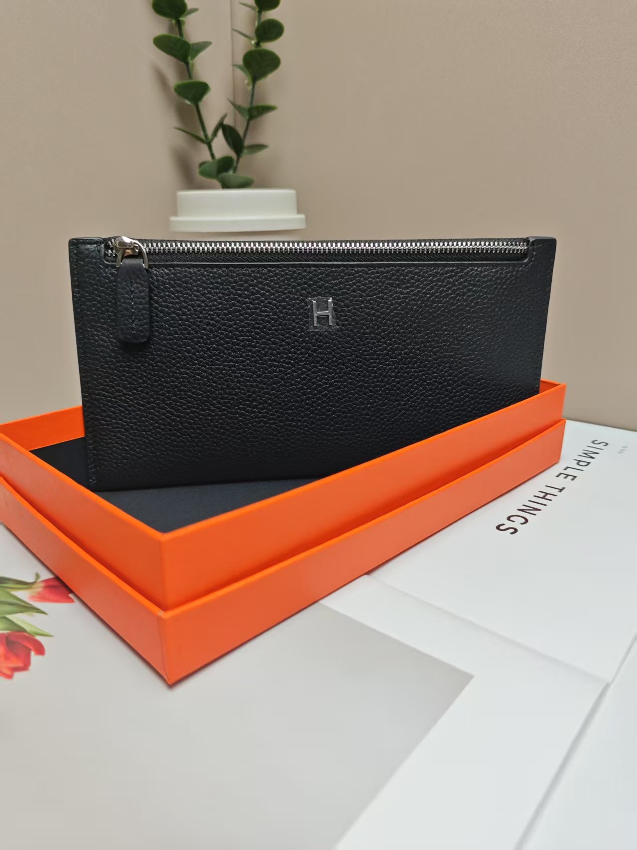 Black wallet, box, genuine leather
