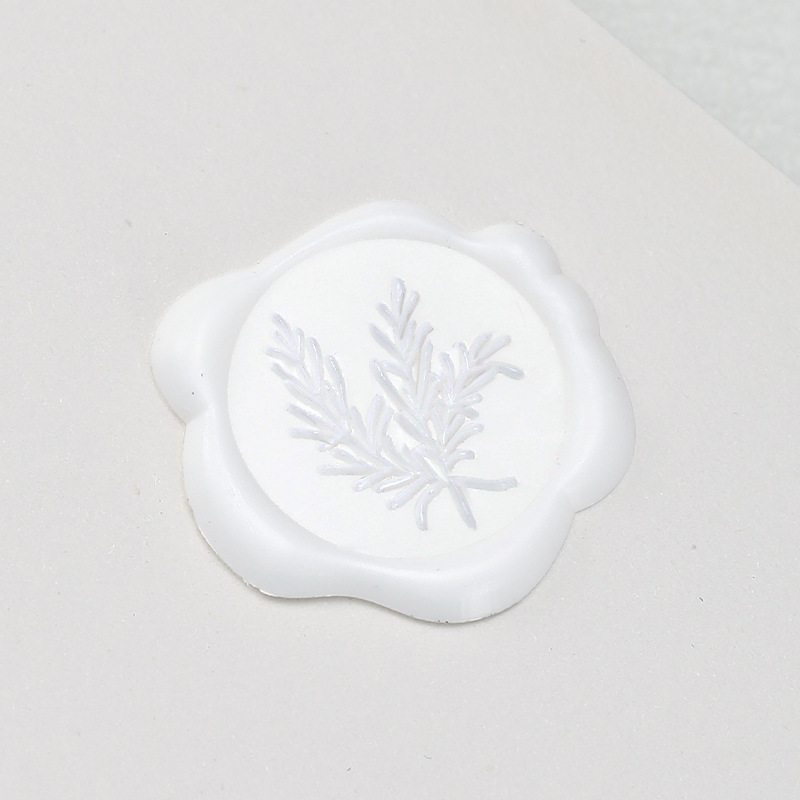 今図の植物の小さいワックスの標識のローズマリーの多色の火の漆の印鑑のシールの封筒の封口は火の漆を貼って決められます。|undefined