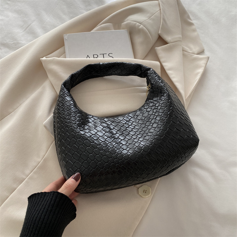 2024 bolsa de tejido de invierno para mujeres nuevas bolsas de bolsillo de estilo extranjero nicho de textura bolsas de viaje versátiles bolsas de mano bolsas ocio