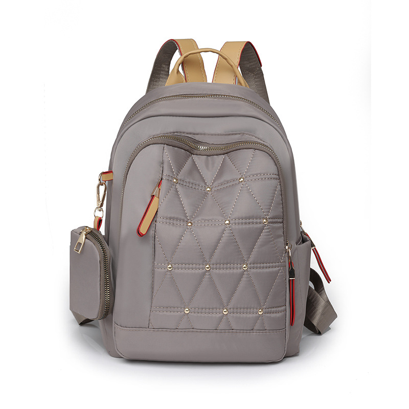 2024 nueva mochila de color de contraste para mujer de moda Lingge ocio de gran capacidad al aire libre mochila de viaje ligera al por mayor