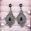 Metal elegant earrings, jewelry for bride, diamond encrusted