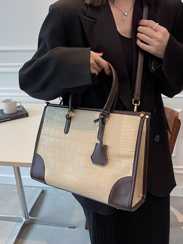 Bolso Tote portátil transfronterizo de gran capacidad para mujer 2025 nuevo modelo retro patrón de piedra contraste bolso de mensajero de hombro de viajero
