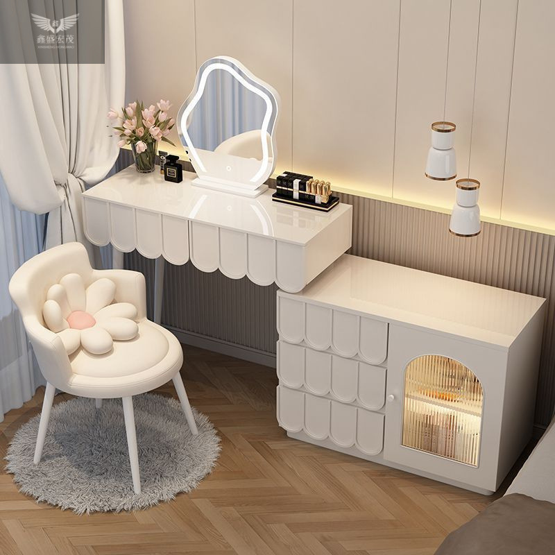 Luz y lujo moderno y simple mesas de maquillaje retráctiles estilo francés crema de estilo dormitorio armario de madera maciza en uno