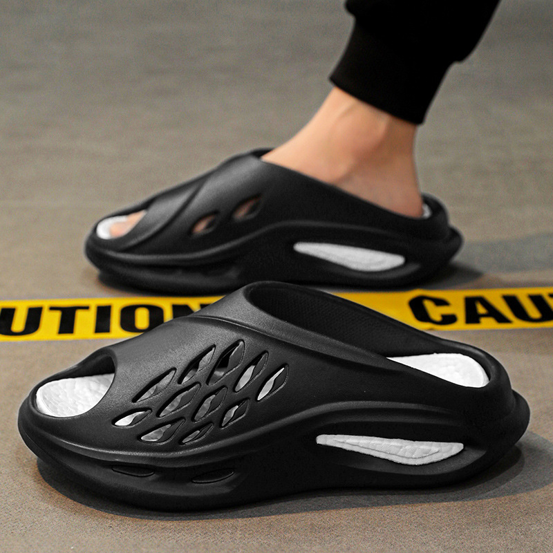 2025 verano nuevo coco Baotou Hole zapatos de tamaño grande playa de tamaño grande comercio exterior Eva pareja sandalias mayorista
