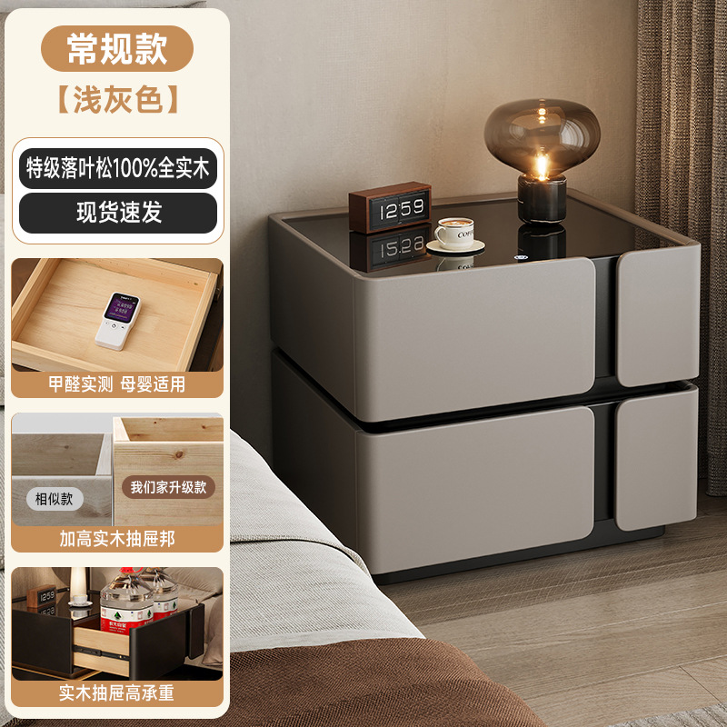 Escritorio de cabezal de cama inteligente dormitorio doméstico 2025 nuevo tipo de lujo ligero de madera sólida de alto nivel multifuncional dormitorio principal de alto valor de cara al lado de la cama gabinete