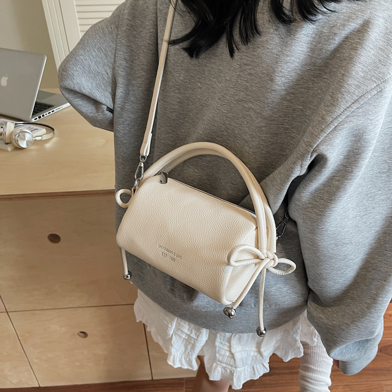 Bolso de mano simple coreano para mujeres 2025, nuevo tipo de bolso de viaje, bolso casual, ligero y de alta calidad.