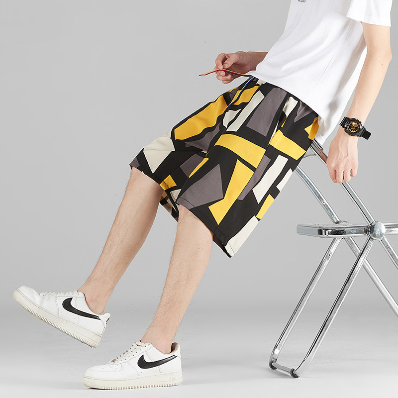 Pantalones de playa de verano, pantalones cortos sueltos para hombres, pantalones grandes de moda, pantalones casuales de hip-hop ligeros, pantalones de cinco puntos de secado rápido