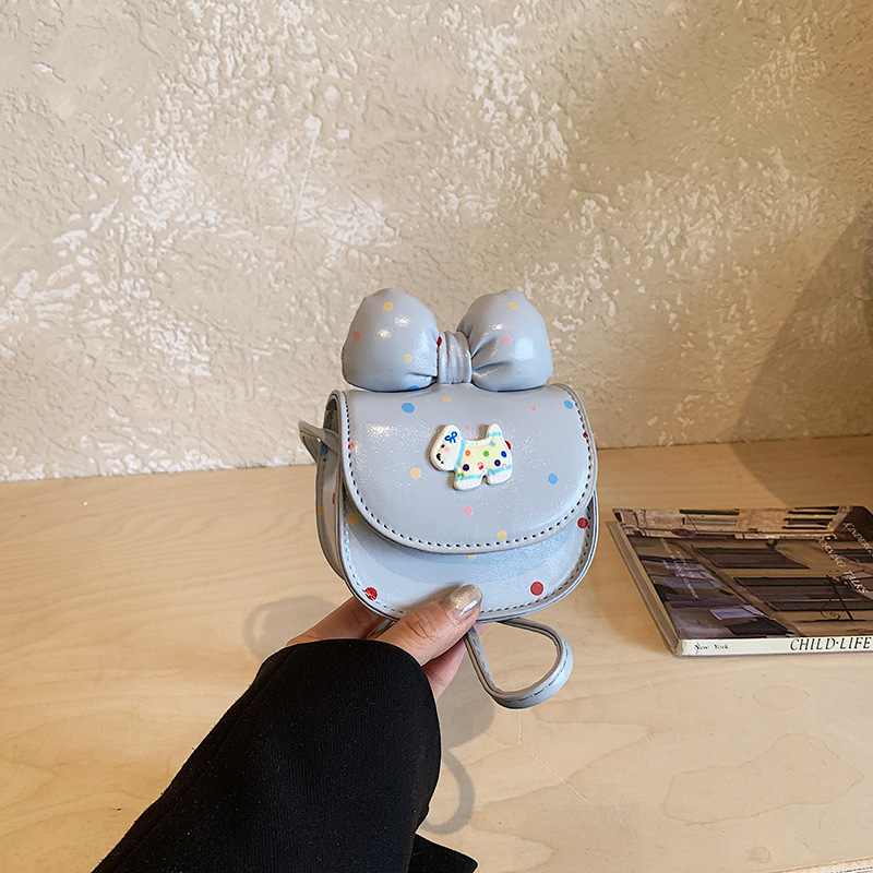 2026 nuevo bolso infantil caricatura perrito lindo arco bolso de cambio de moda punto de onda bolso accesorios de niña pequeña