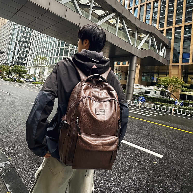 Mochila de escuela secundaria mayorista de moda de hombre mochila de cuero suave de moda de hombre sensación avanzada de mochila de escolares de escuela secundaria