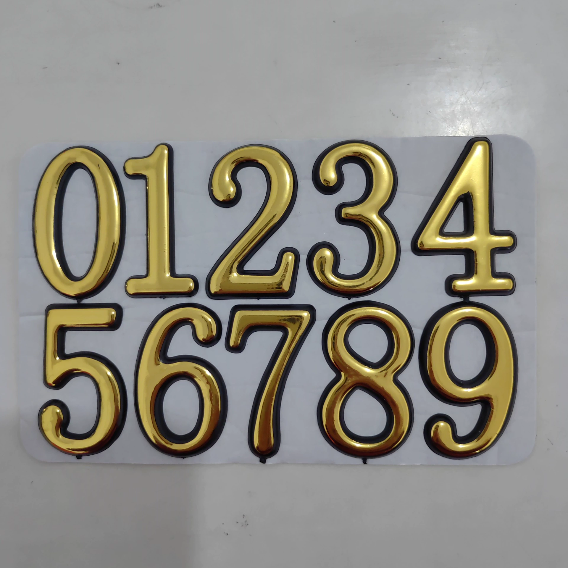 Пластиковые таблички с номерами домов