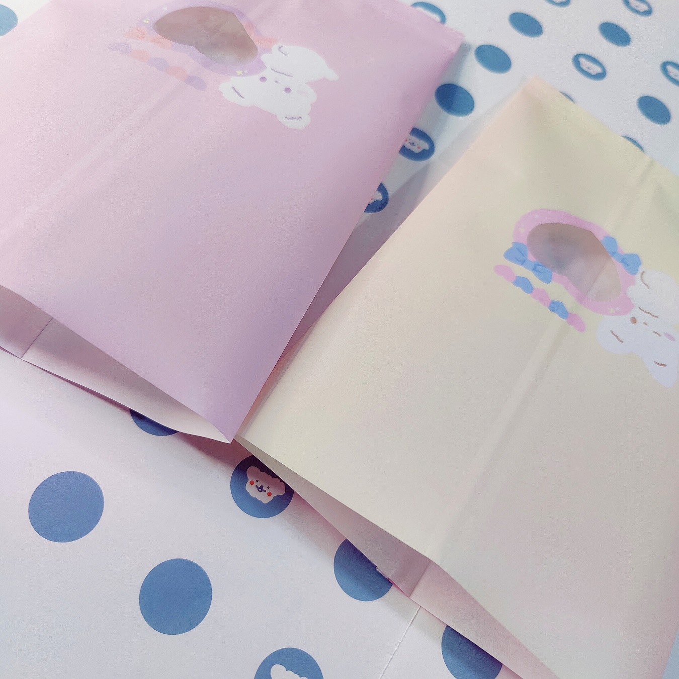 Japonés y coreano ins estilo lindo Internet celebridad FLO conejo bolsa de papel regalo joyería bolsa de embalaje foto accesorios de almacenamiento de papel